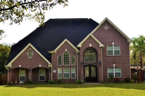 white brick house metal roof|roof and brick color combinations.